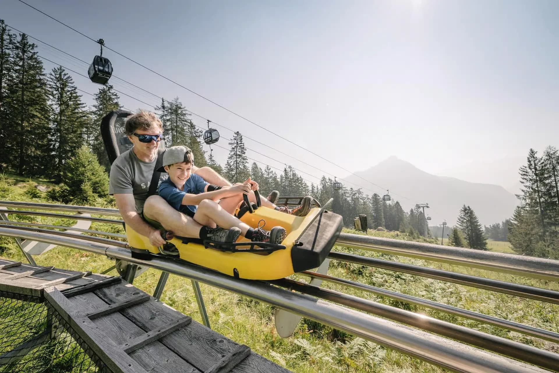 Riding the Alpine Coaster on Mount Kuk