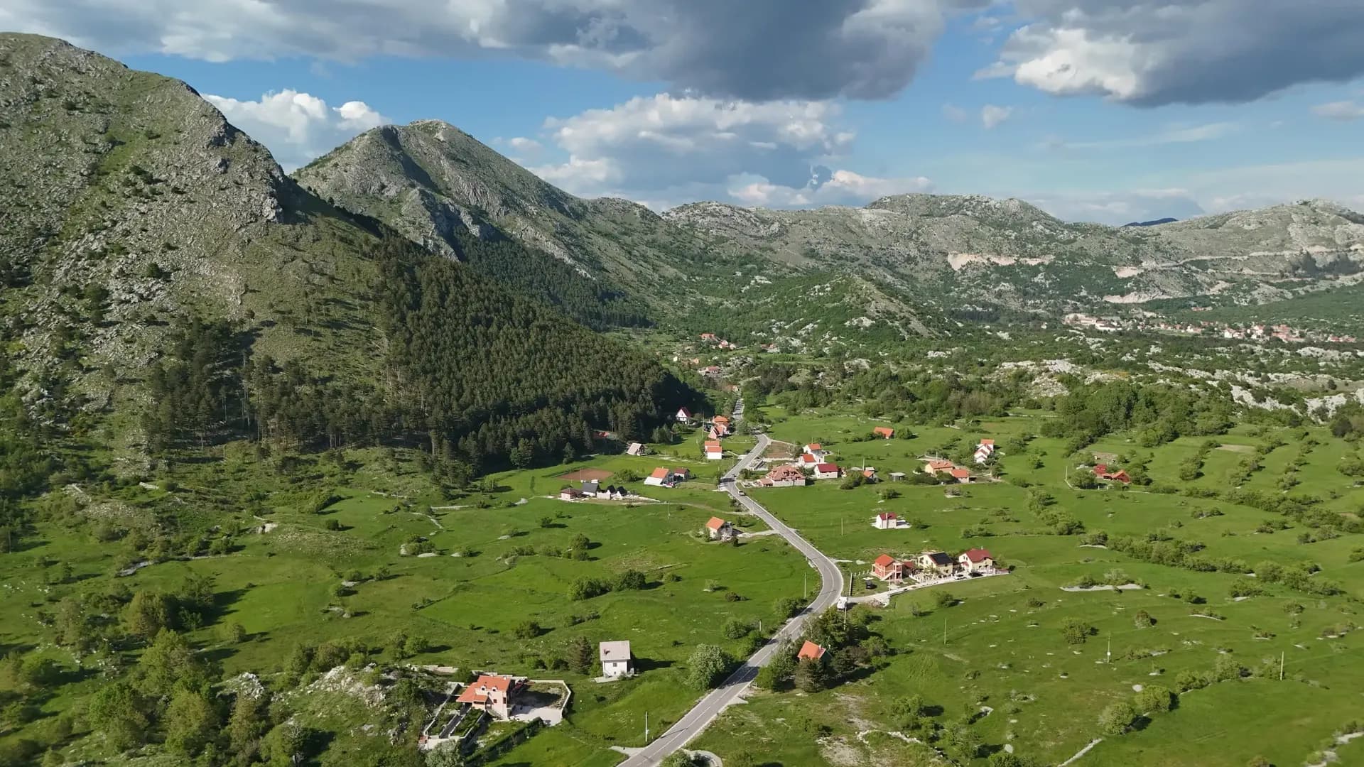 Njeguši village in its green mountain valley